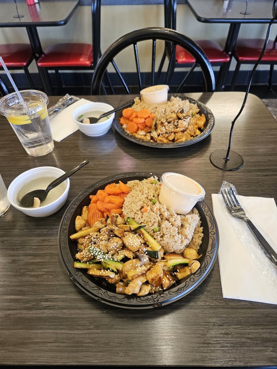 Menu board with grilled entrée choices.