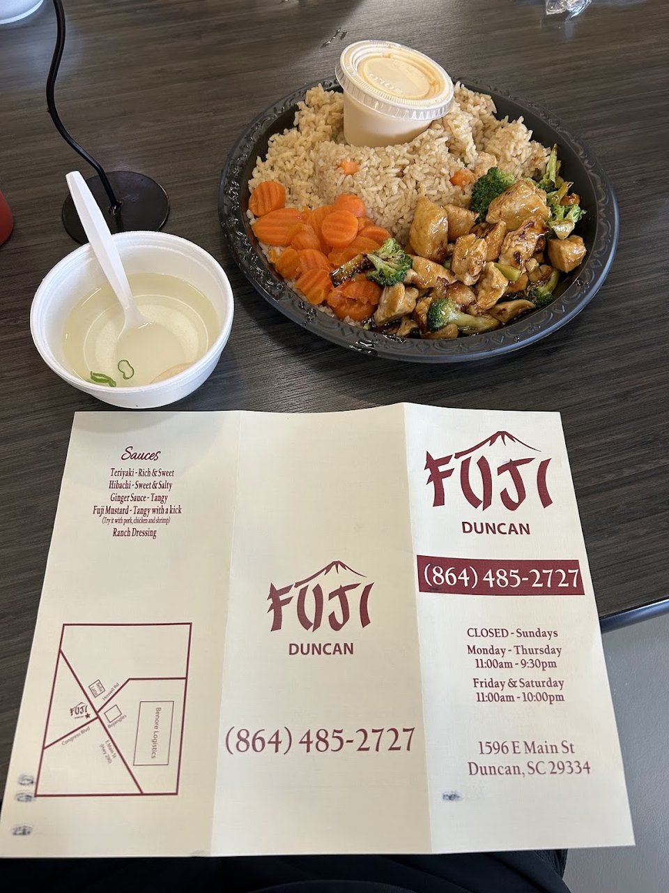 Printed menu with chicken and vegetable plates.