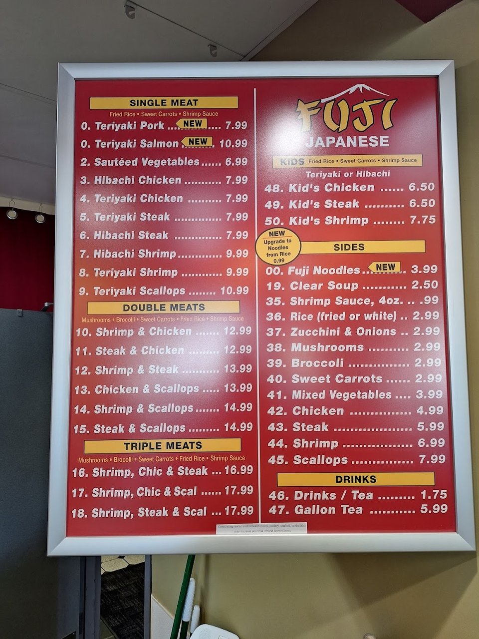 Menu board with grilled entrée choices.